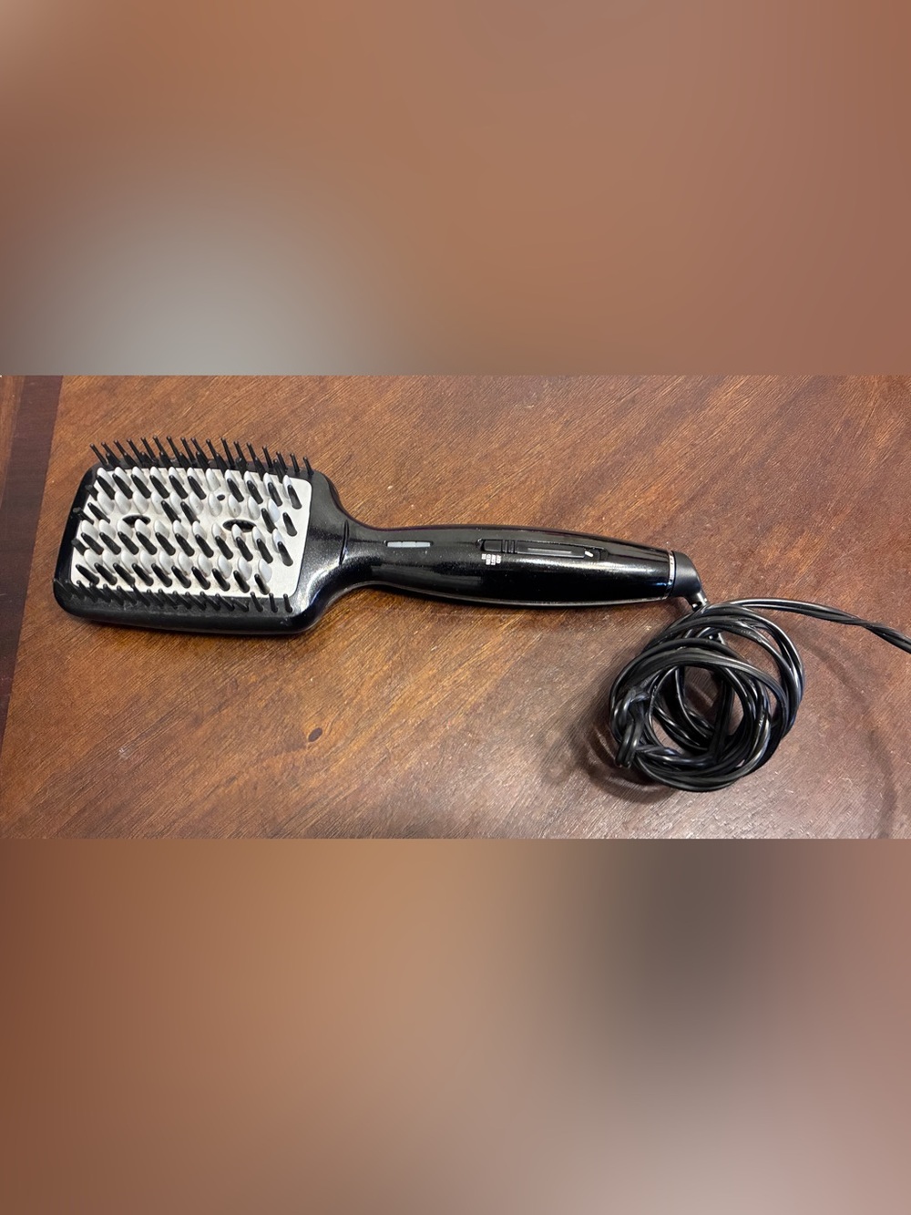 Conair infinity pro 
Electric Hair Straightening Brush